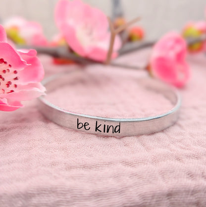 be kind cuff bracelet aluminum front
outside